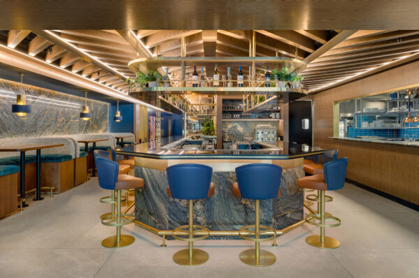 Zeru Miami restaurant bar and dining area featuring custom banquettes and barstools manufactured by A Squared Design Studio.