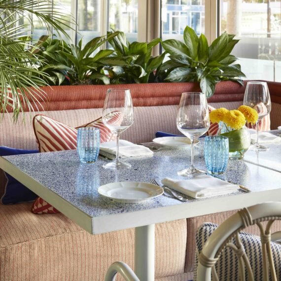 Mirabella Restaurant at Fontainebleau Miami Beach featuring custom furniture manufactured by A Squared Design Studio.